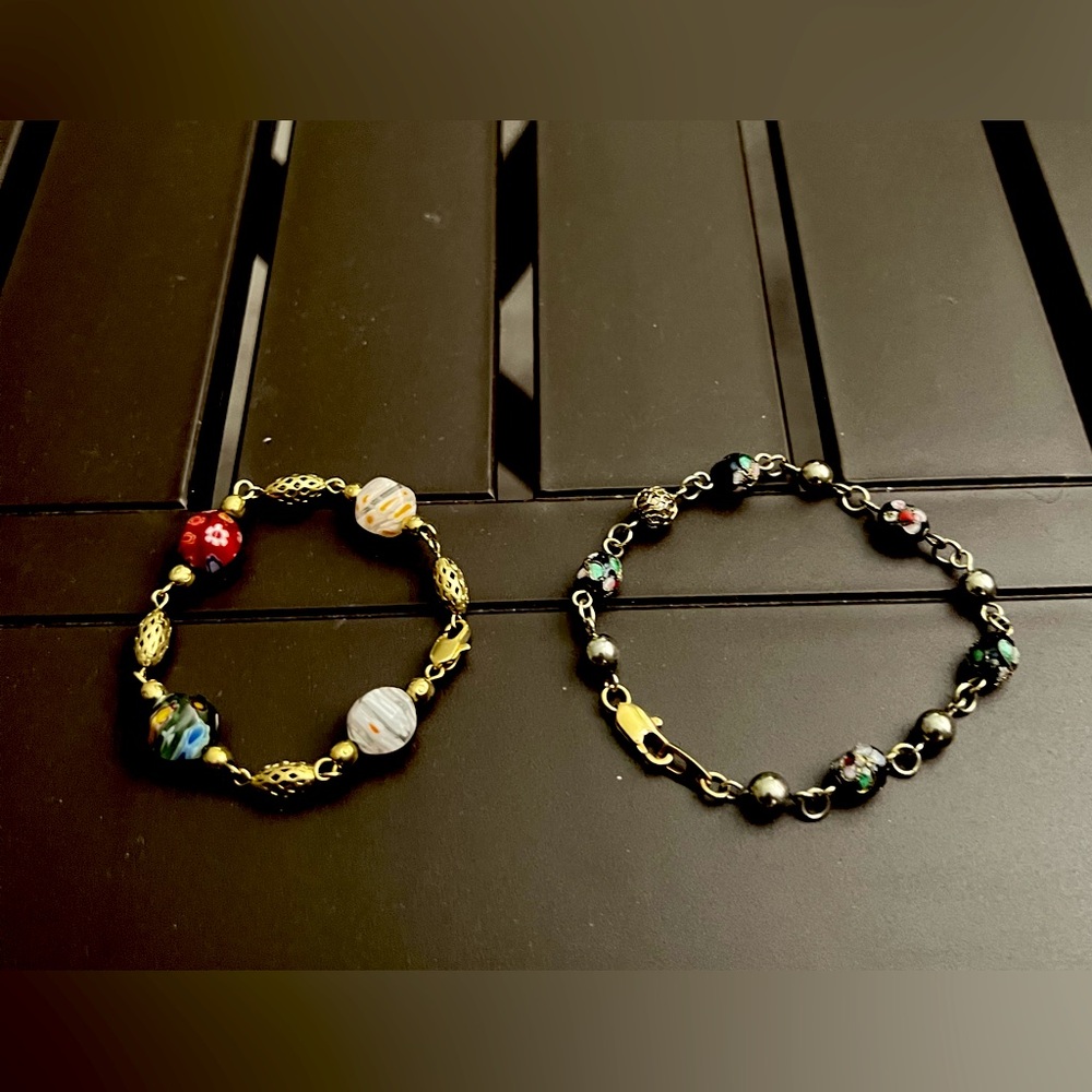 Lot of 2: gold tone and silver tone bead bracelets